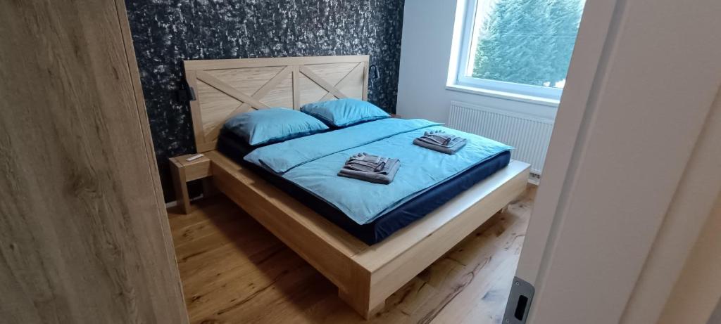 Postel nebo postele na pokoji v ubytování Apartmán Nely