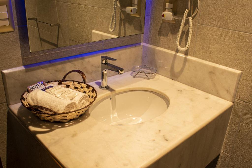 Koupelna v ubytování FORTICH APART HOTEL