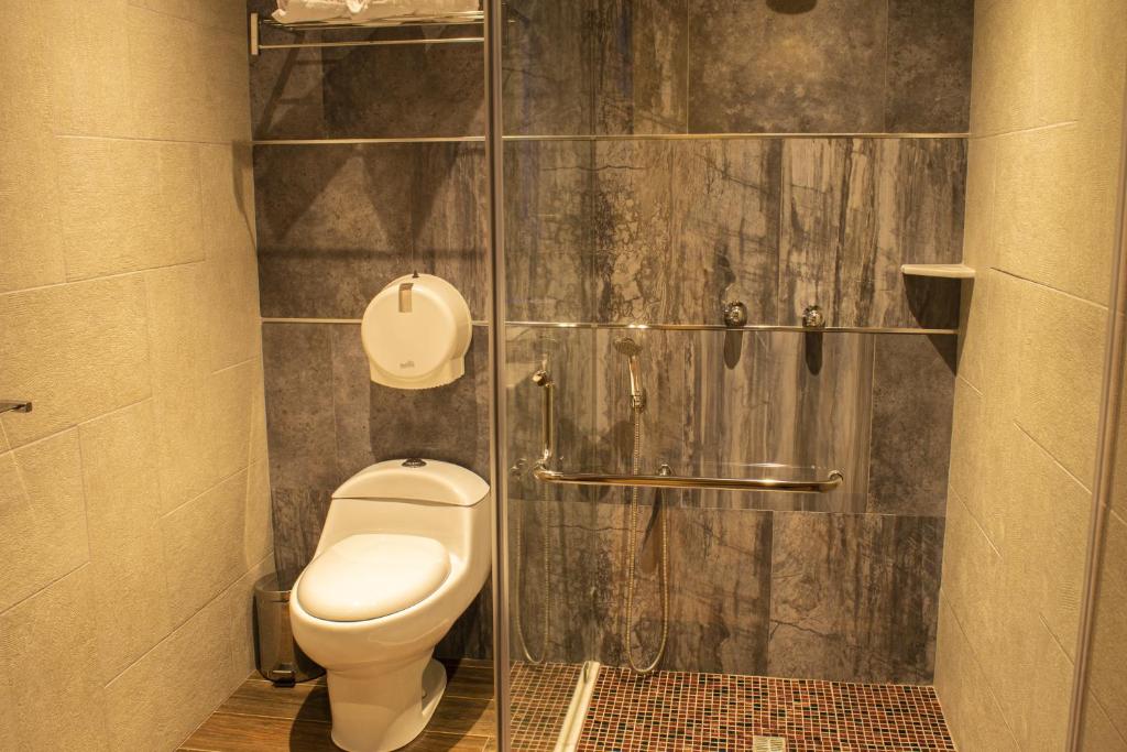 Koupelna v ubytování FORTICH APART HOTEL