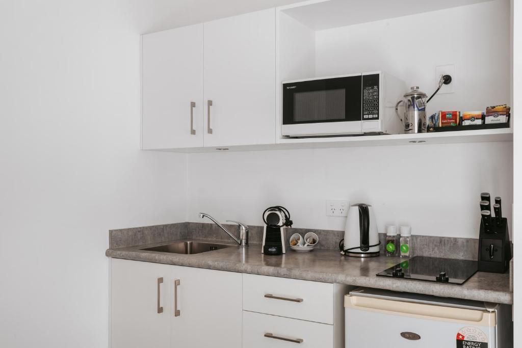 Kuchyň nebo kuchyňský kout v ubytování Rolleston Motel Thames - Wenzel Motels