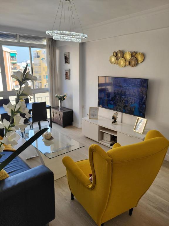 Televízia a/alebo spoločenská miestnosť v ubytovaní Appartement centre ville Malaga