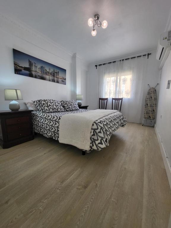 Posteľ alebo postele v izbe v ubytovaní Appartement centre ville Malaga