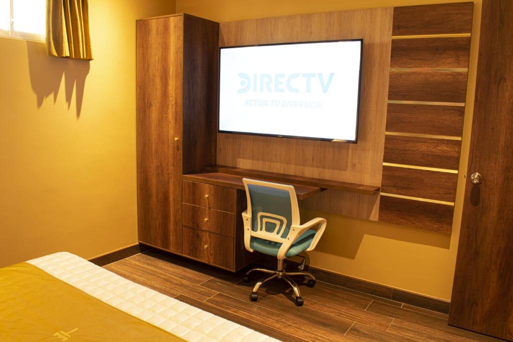 TV a/nebo společenská místnost v ubytování FORTICH APART HOTEL