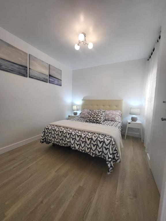 Posteľ alebo postele v izbe v ubytovaní Appartement centre ville Malaga