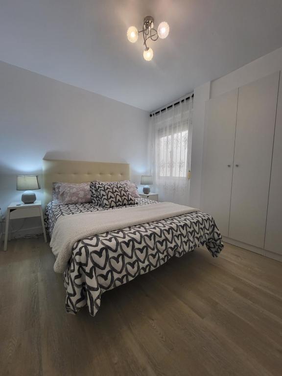 Posteľ alebo postele v izbe v ubytovaní Appartement centre ville Malaga