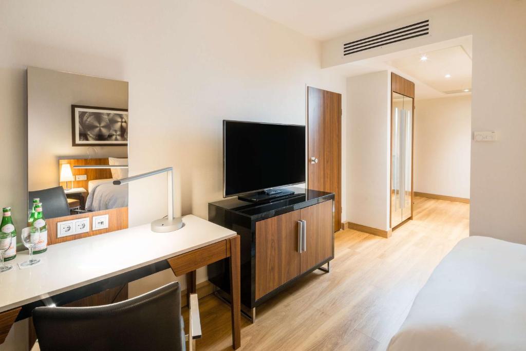 TV a/nebo společenská místnost v ubytování Radisson Blu Hotel, Hamburg