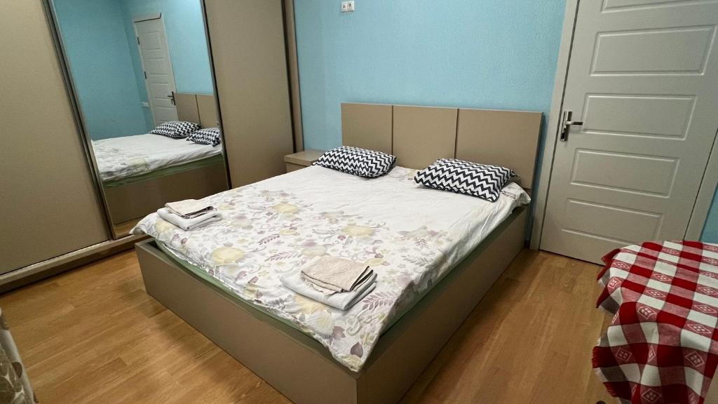 Postel nebo postele na pokoji v ubytování Rest House Tbilisi