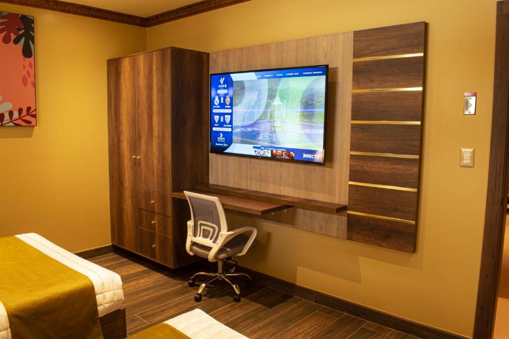 TV a/nebo společenská místnost v ubytování FORTICH APART HOTEL