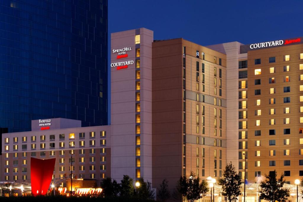 a building with a sign on the side of it at SpringHill Suites Indianapolis Downtown in Indianapolis