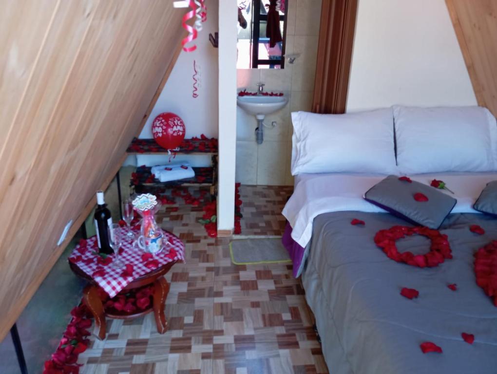 Postel nebo postele na pokoji v ubytování Hospedaje Villa Rosita Suesca