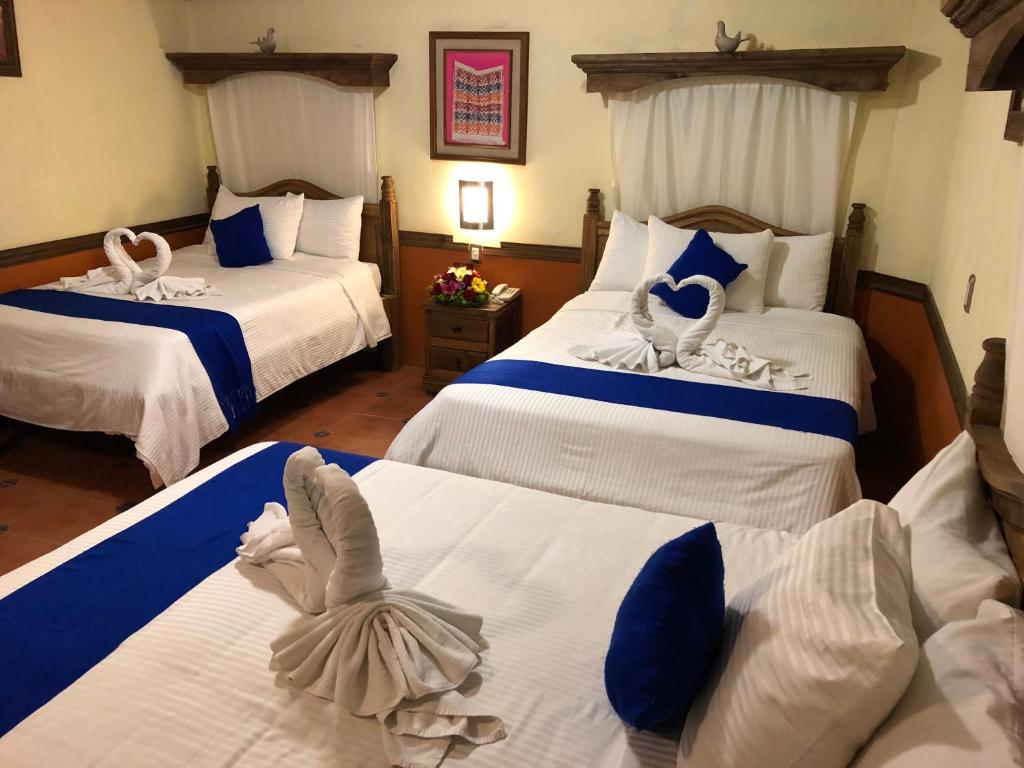 Postel nebo postele na pokoji v ubytování Hotel Tradicional