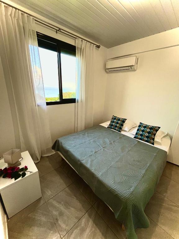 Postel nebo postele na pokoji v ubytování La villa O'rizon
