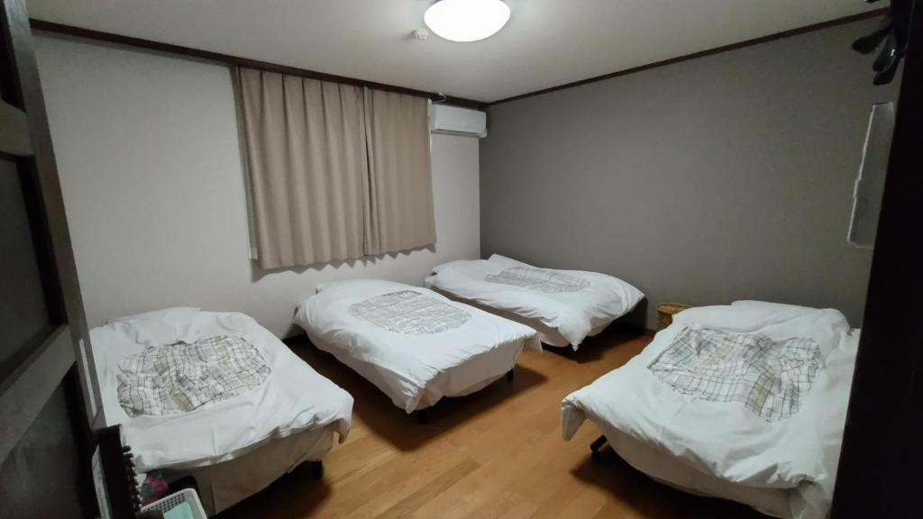Posteľ alebo postele v izbe v ubytovaní Guest houseTakagi - Vacation STAY 59922v