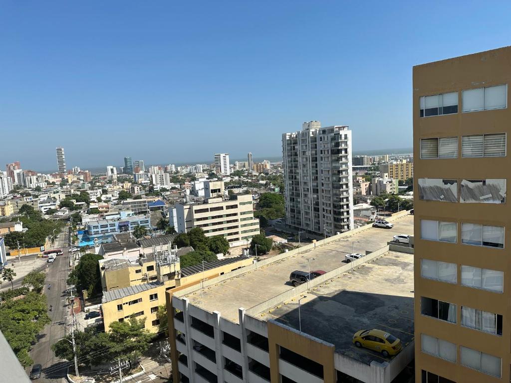 a view of a city from a building at Apartamento cerca a zonas exclusivas de Barranquilla in Barranquilla