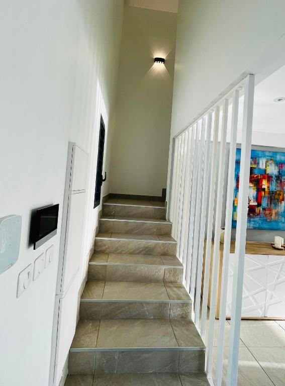 TV a/nebo společenská místnost v ubytování La villa O'rizon