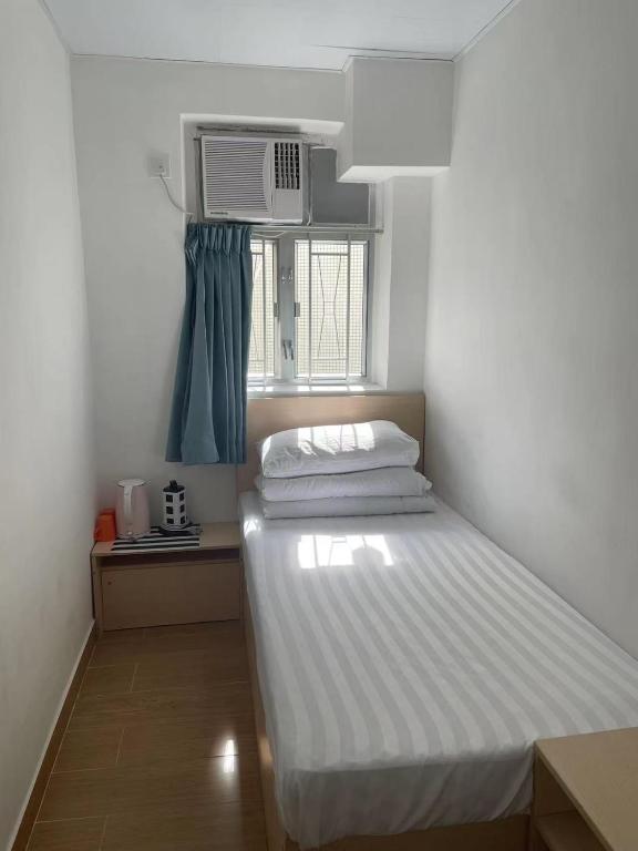 Postel nebo postele na pokoji v ubytování Timehouse Hong Kong Hostel Group