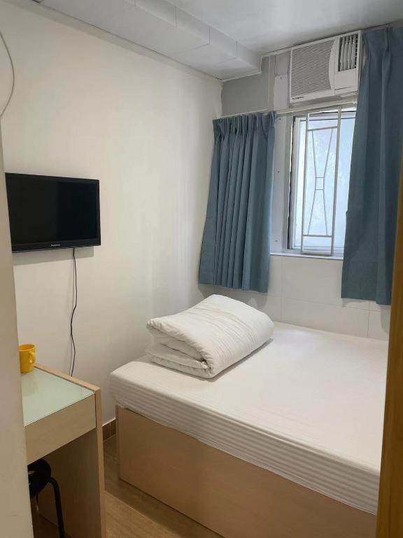 Postel nebo postele na pokoji v ubytování Timehouse Hong Kong Hostel Group