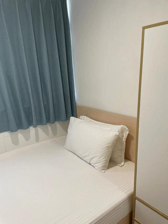 Postel nebo postele na pokoji v ubytování Timehouse Hong Kong Hostel Group