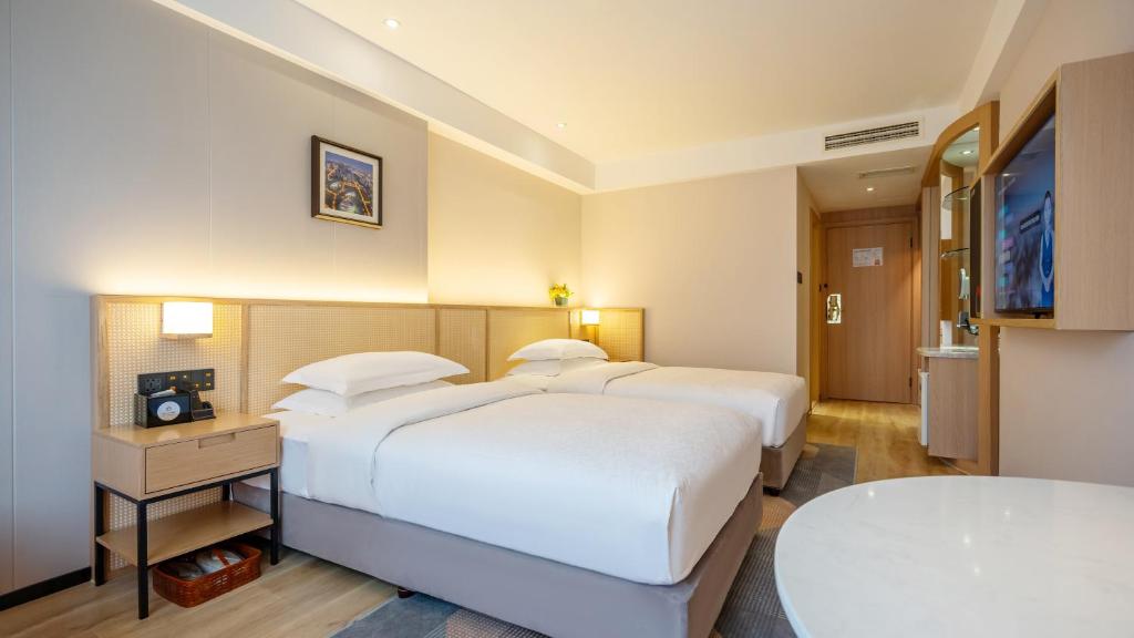 Fotografie z fotogalerie ubytování GEM Flower Jinyu Sunshine Hotel v destinaci Čcheng-tu