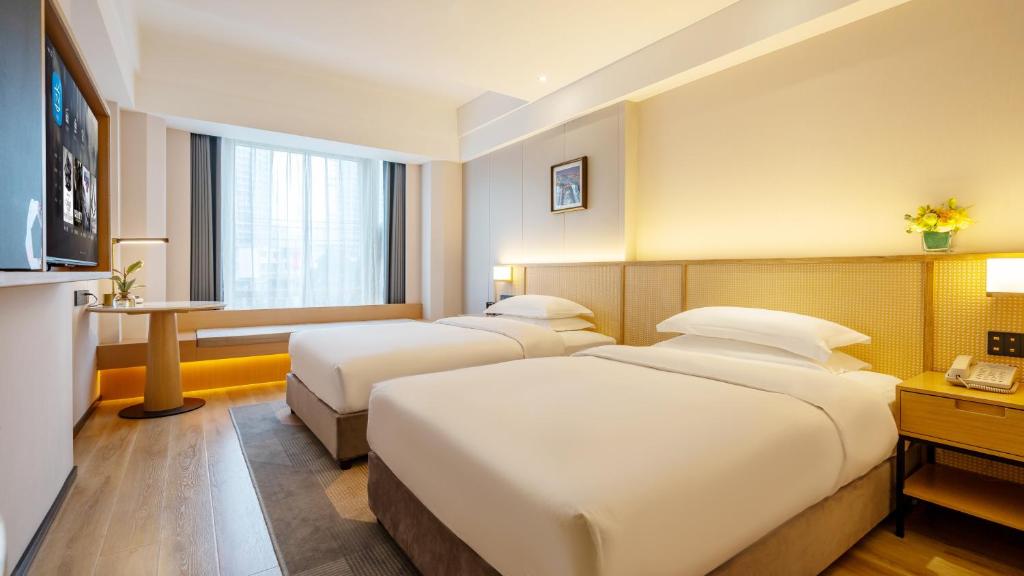 Fotografie z fotogalerie ubytování GEM Flower Jinyu Sunshine Hotel v destinaci Čcheng-tu