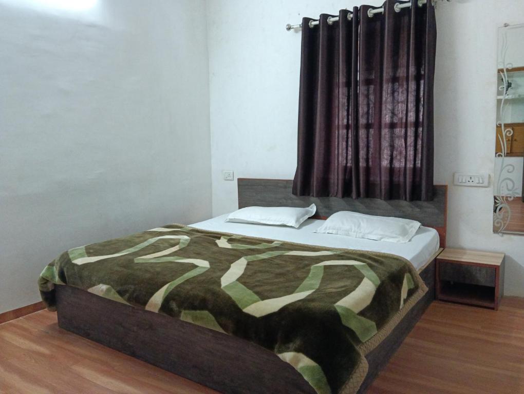 Кровать или кровати в номере Palms View Villa Home Stay