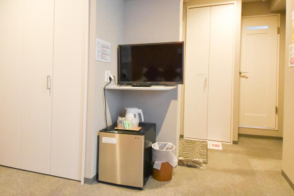 ホテル寧楽にあるテレビまたはエンターテインメントセンター