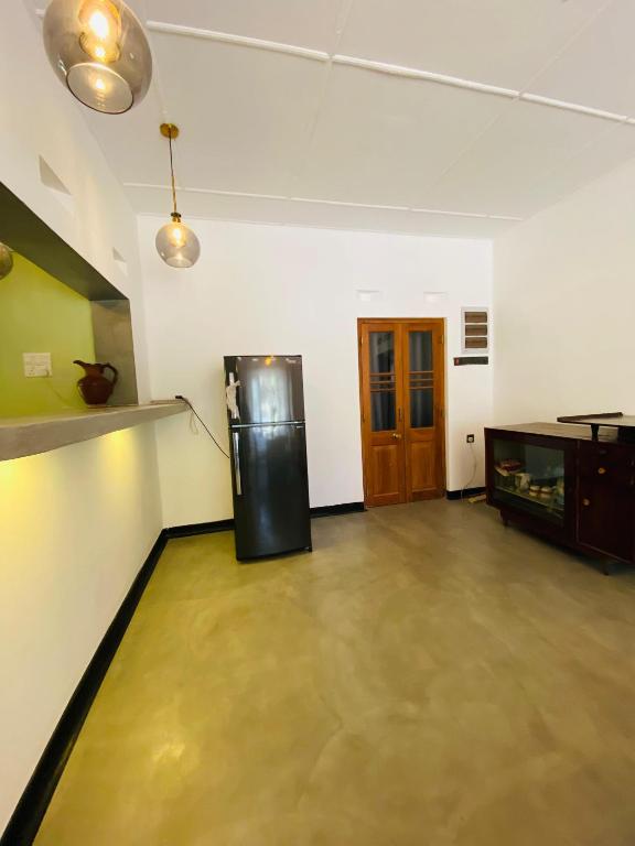 Kuchyň nebo kuchyňský kout v ubytování Happy Valley Residence Unawatuna