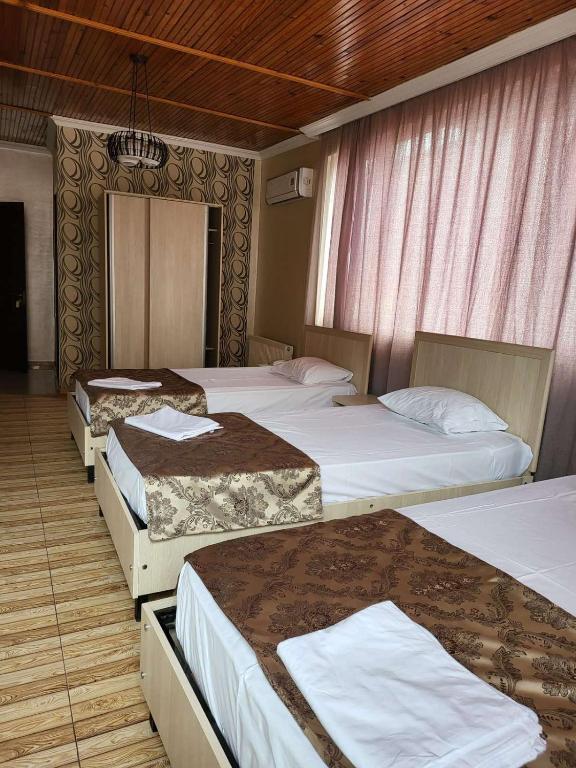Postel nebo postele na pokoji v ubytování Hotel Elio