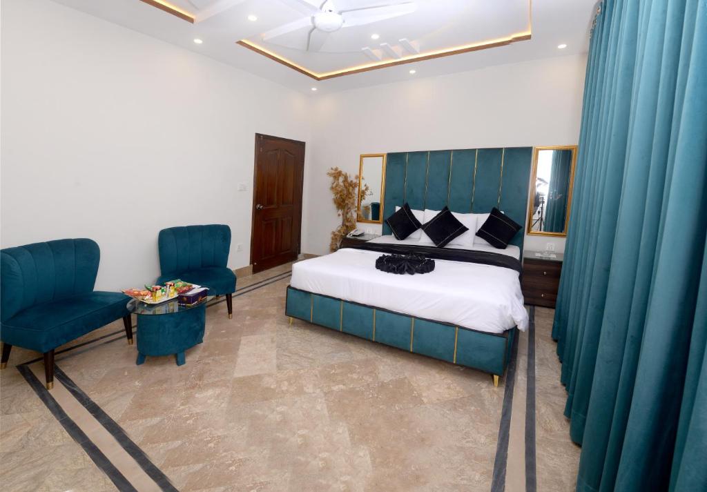 Voodi või voodid majutusasutuse Hotel Five Season Lahore toas