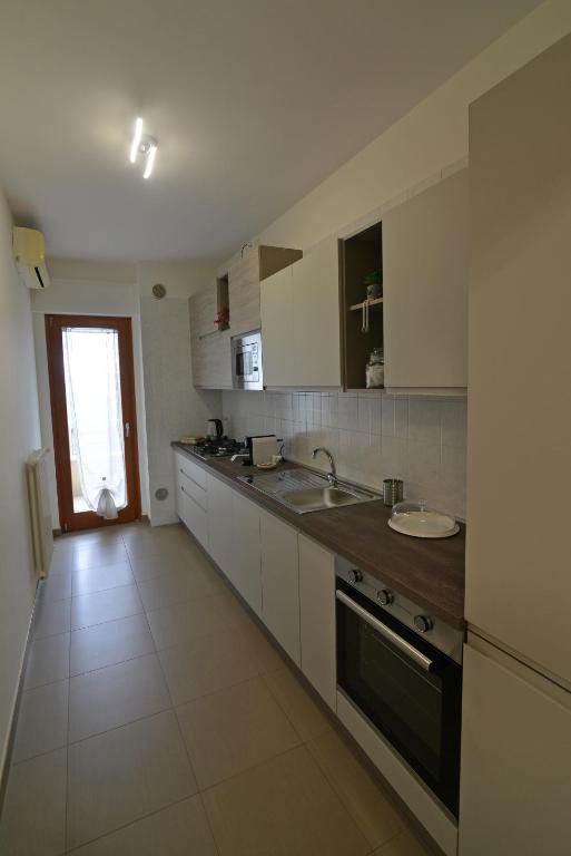 Kuchyň nebo kuchyňský kout v ubytování My Home