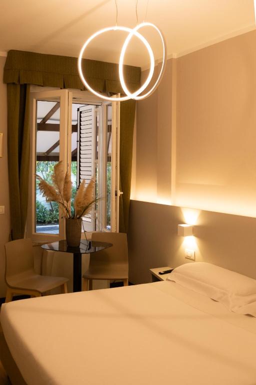 Postel nebo postele na pokoji v ubytování Hotel Motel 2000