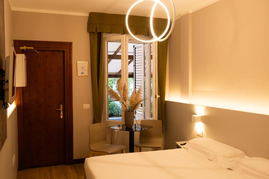 Postel nebo postele na pokoji v ubytování Hotel Motel 2000