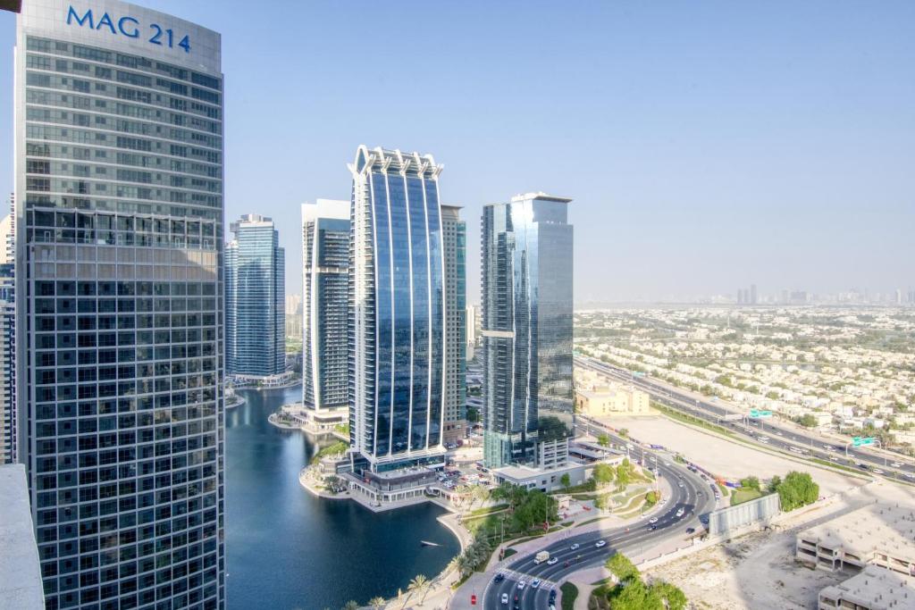an aerial view of a city with tall buildings at Premium 1BHK near Metro station Dubai Marina & JBR in Dubai