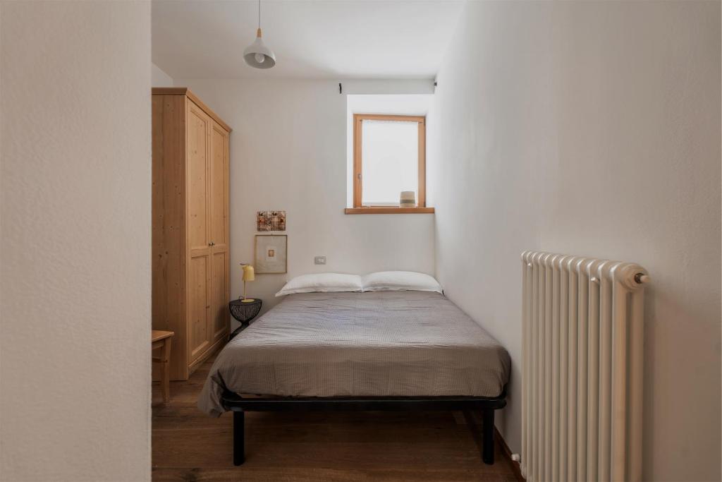 Postel nebo postele na pokoji v ubytování Pietra Rara Apartments