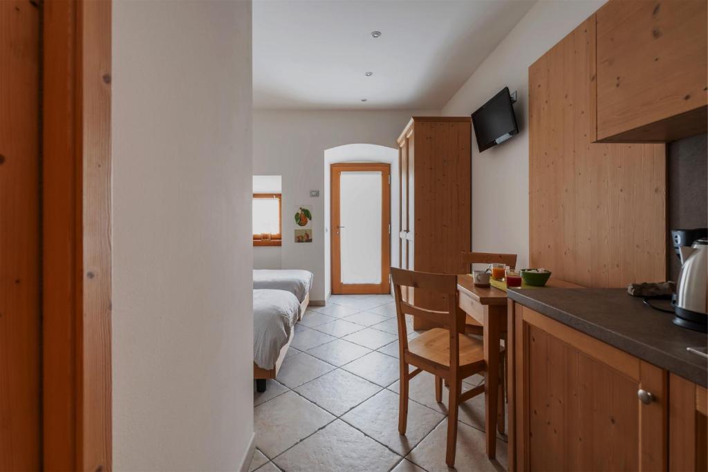 Kuchyň nebo kuchyňský kout v ubytování Pietra Rara Apartments