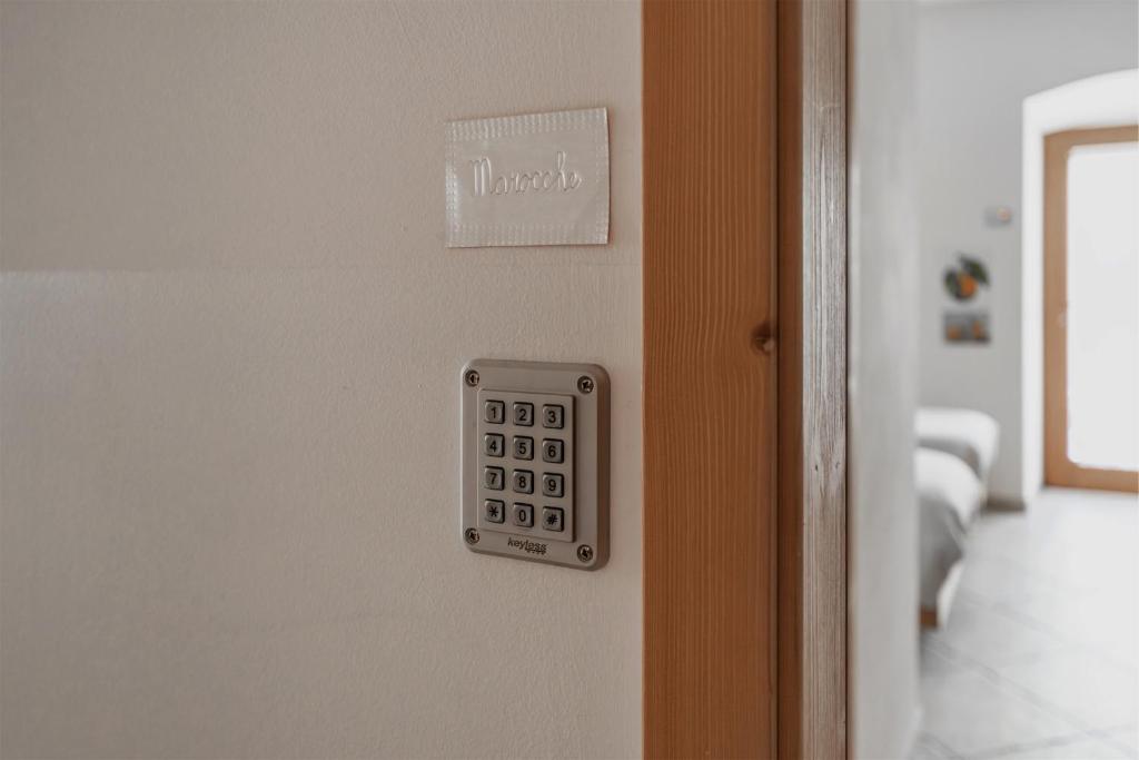 Postel nebo postele na pokoji v ubytování Pietra Rara Apartments