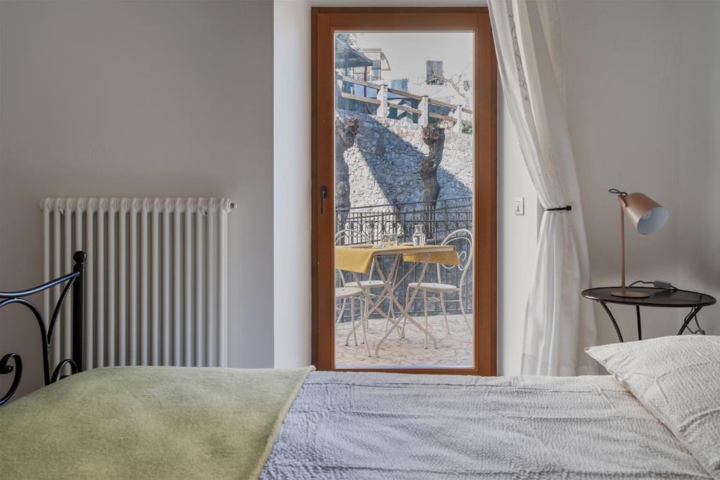 Postel nebo postele na pokoji v ubytování Pietra Rara Apartments