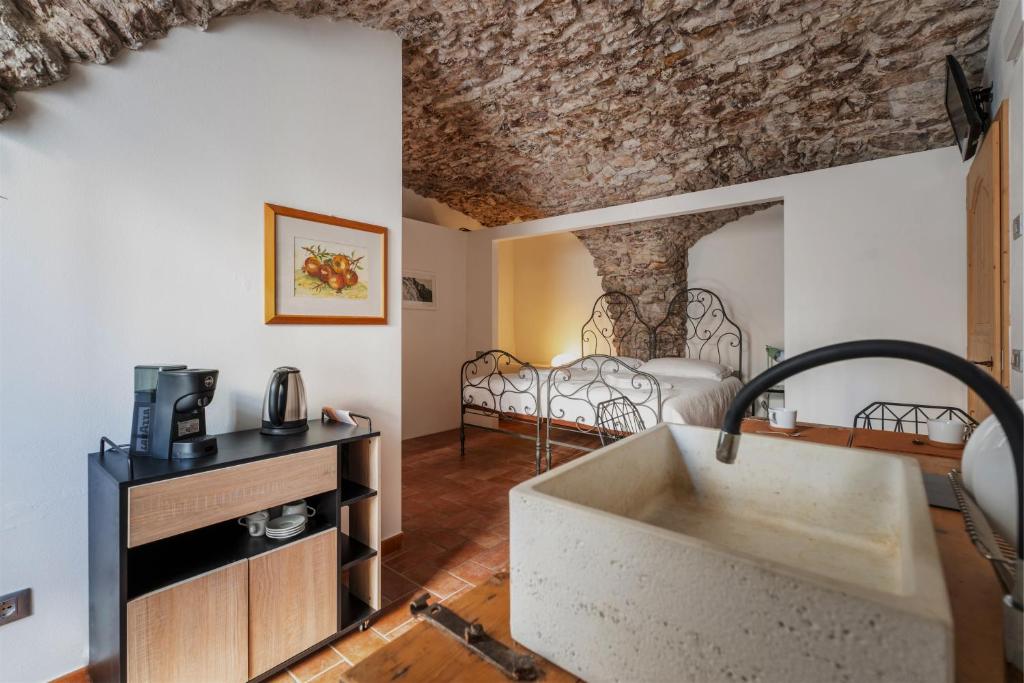 Postel nebo postele na pokoji v ubytování Pietra Rara Apartments