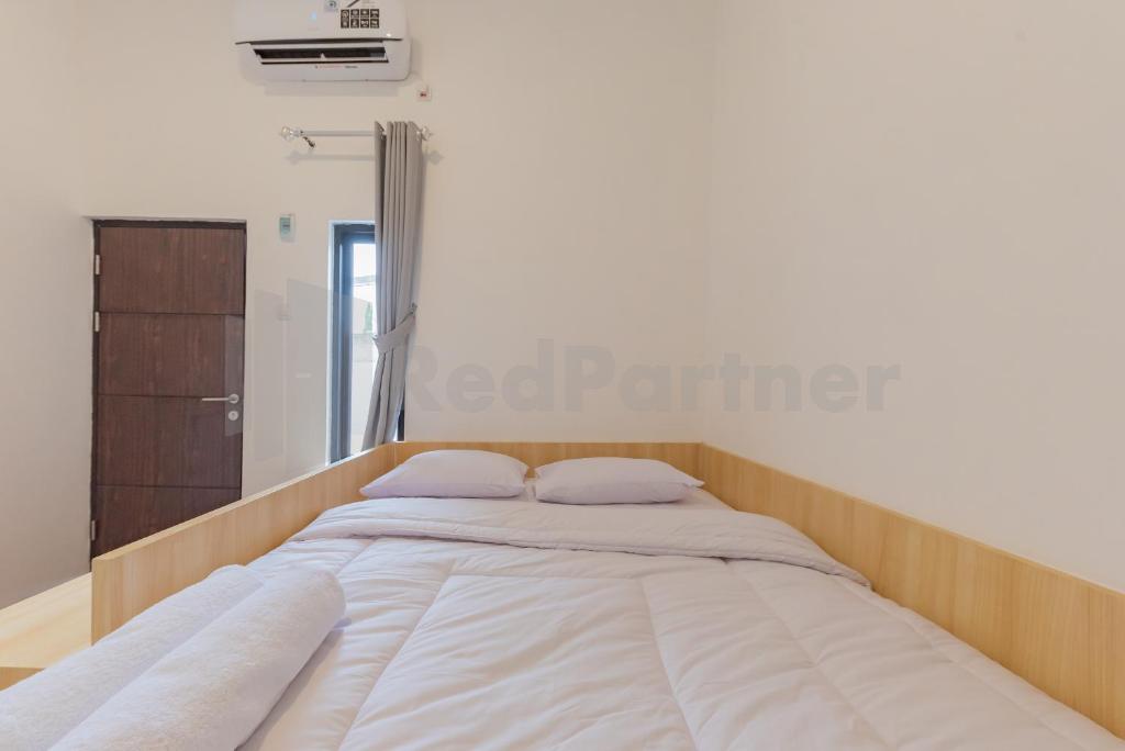 Rumah Panda Guesthouse RedPartner - Deluxe Doppelzimmer