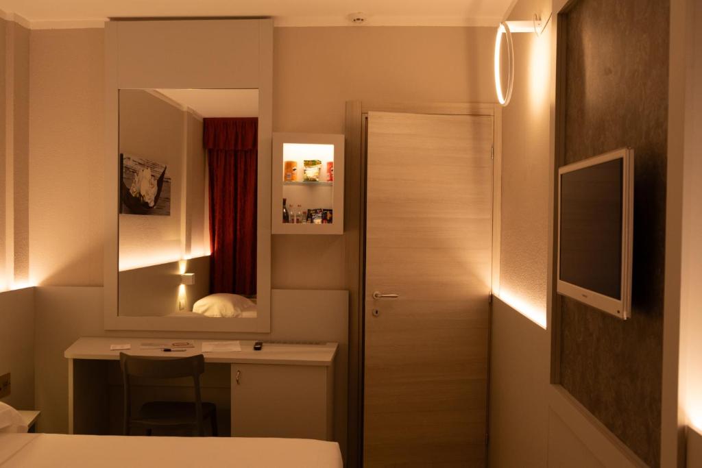 Postel nebo postele na pokoji v ubytování Hotel Motel 2000