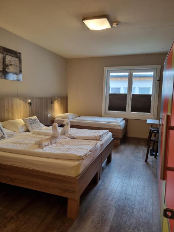 Posteľ alebo postele v izbe v ubytovaní Cubo Sport & Art Hotel