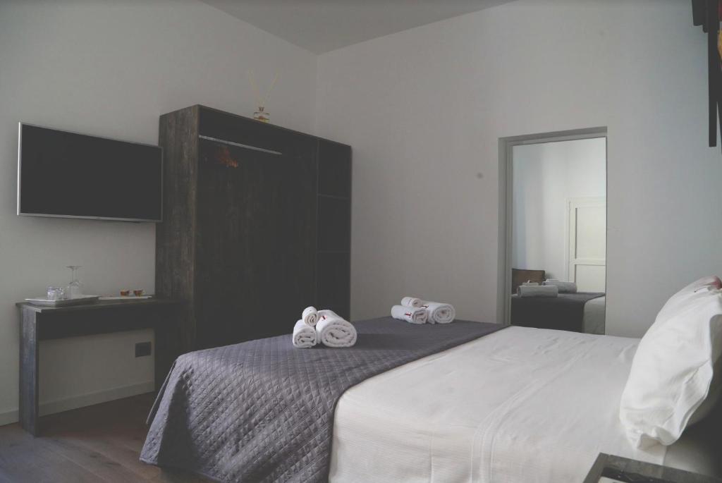 Postel nebo postele na pokoji v ubytování T rooms