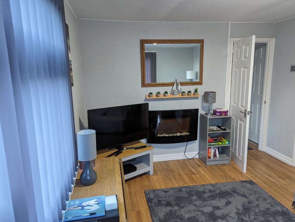 TV a/nebo společenská místnost v ubytování 238b South shore