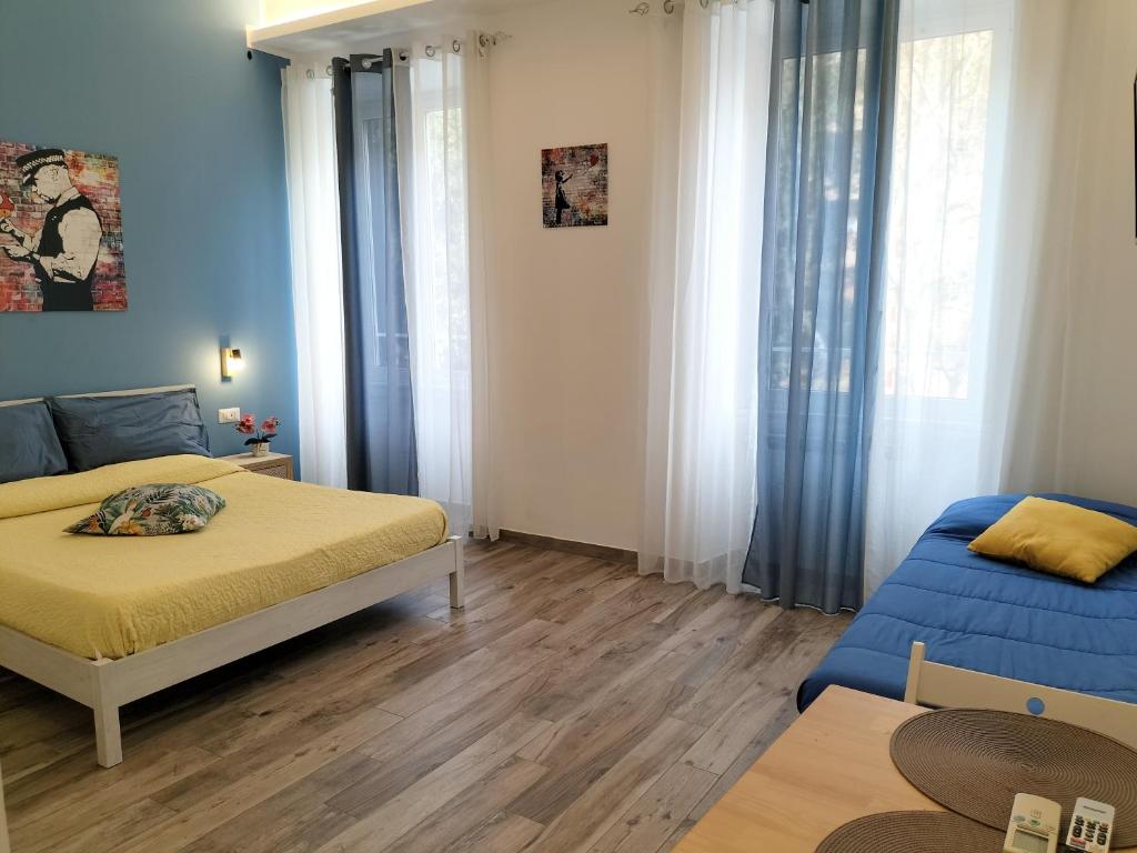 Posteľ alebo postele v izbe v ubytovaní Locazione Turistica Civico 60