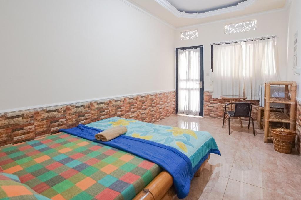 Postel nebo postele na pokoji v ubytování Green View Ubud Hostel Bali