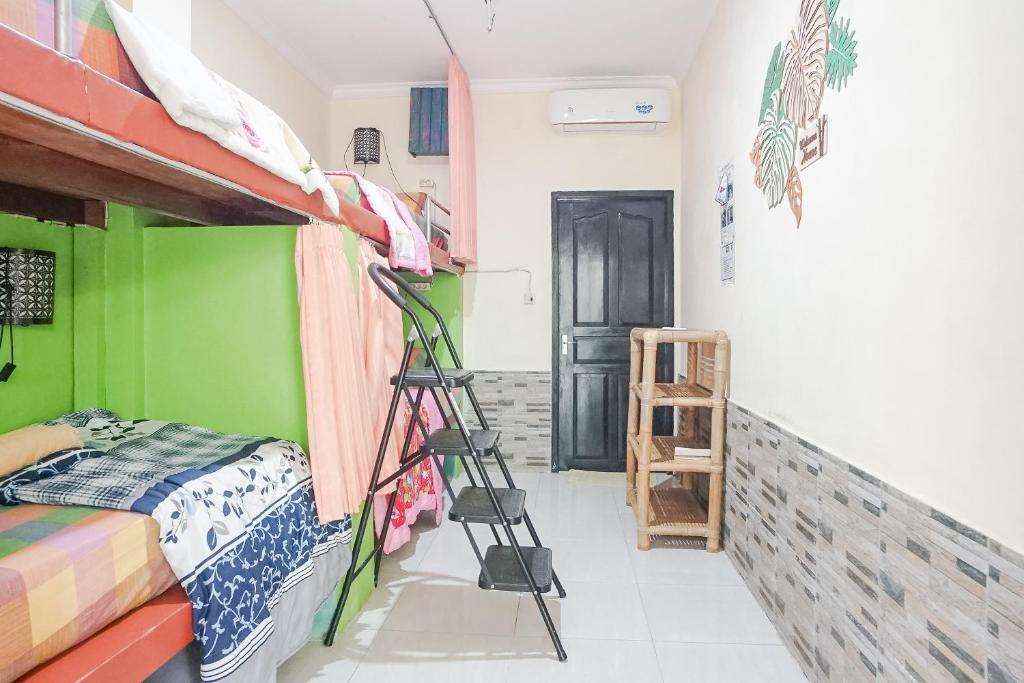 Postel nebo postele na pokoji v ubytování Green View Ubud Hostel Bali