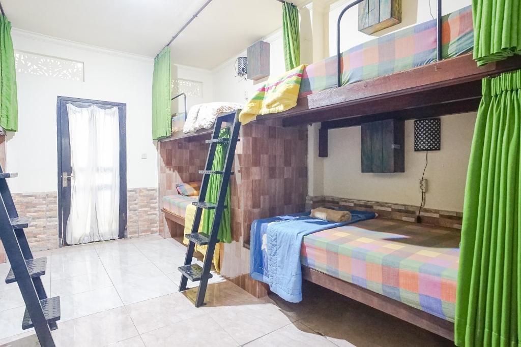Postel nebo postele na pokoji v ubytování Green View Ubud Hostel Bali