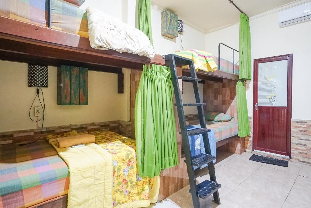 Postel nebo postele na pokoji v ubytování Green View Ubud Hostel Bali