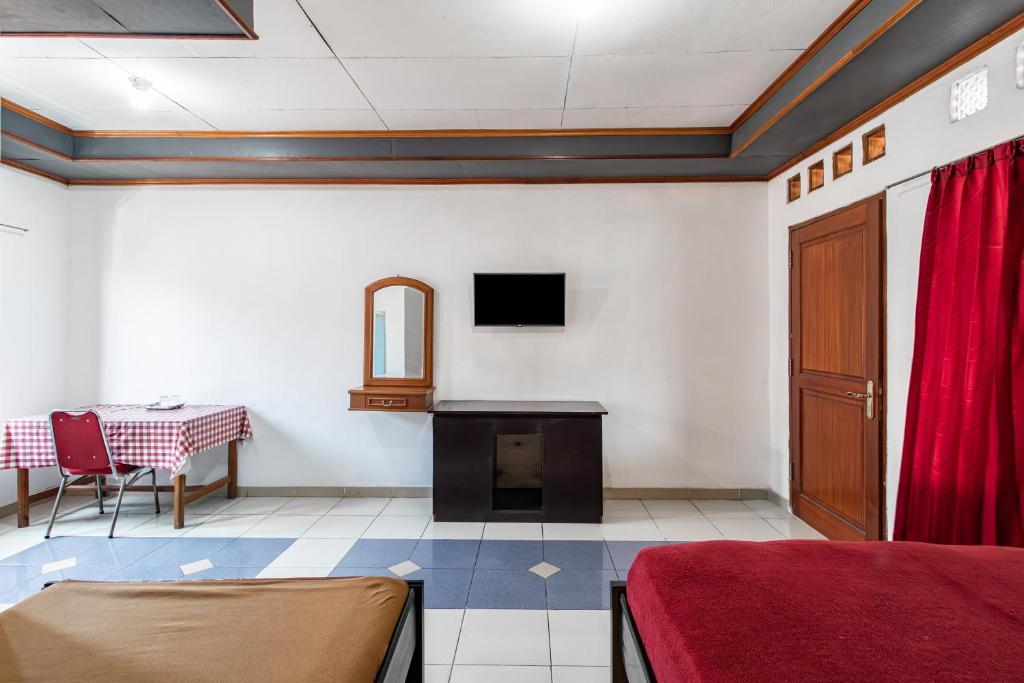 TV a/nebo společenská místnost v ubytování Abang Hotel Ciwidey