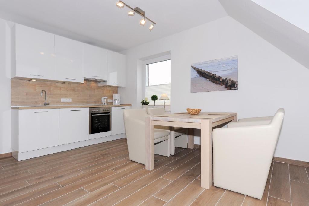 Kuchyň nebo kuchyňský kout v ubytování Ferienwohnung Inselstern - Residenz an der Nordseetherme